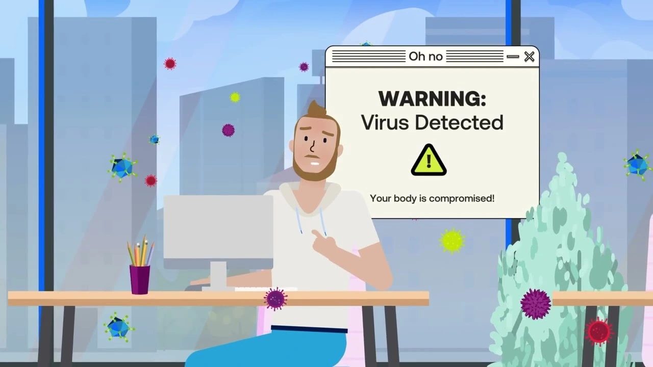 男子坐在电脑前，电脑弹出病毒广告。