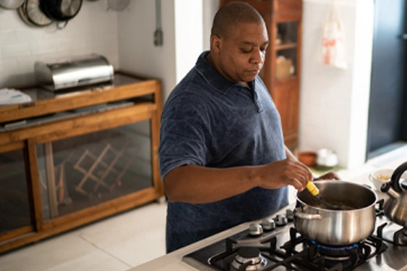 Can You Share a Kitchen With Someone Who Has Covid: Essential Safety Tips